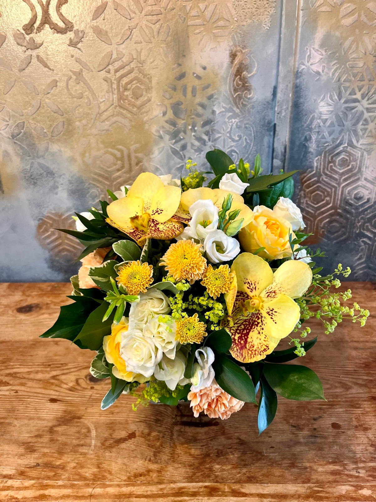 Flower Arrangement in shades of Yellows, Whites and Peaches