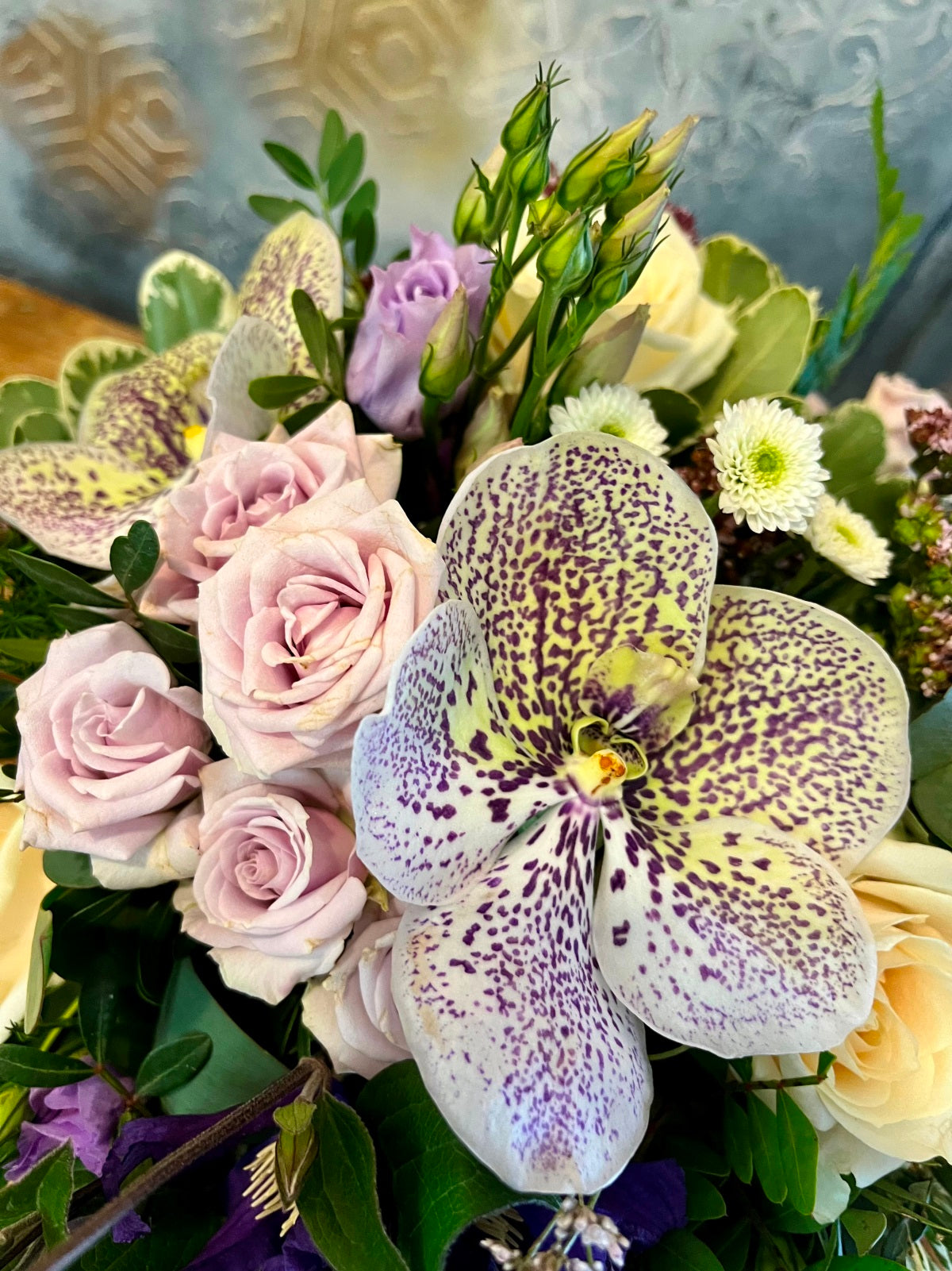 Flower Arrangement in shades of Lilac and Cream close up image
