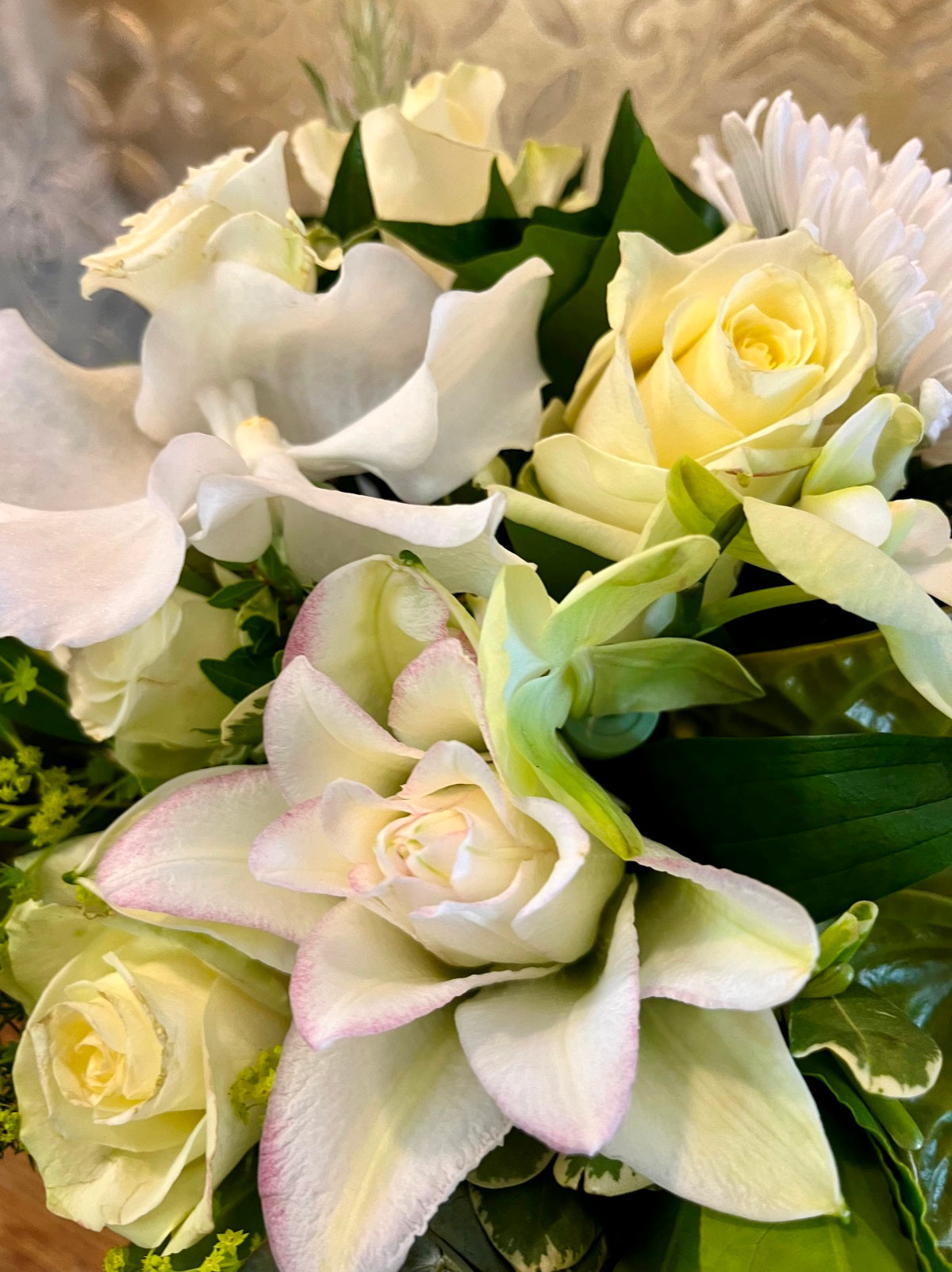 Flower Arrangement in shades of Creams, Greens and Whites zoomed in