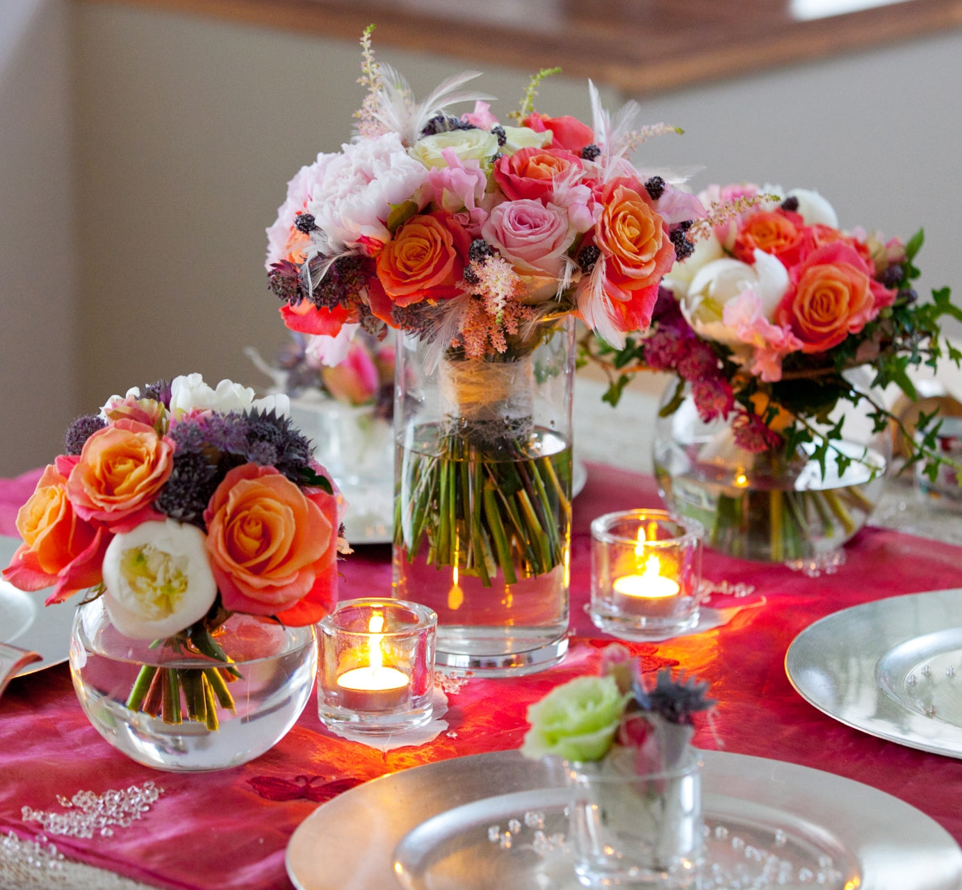 Beautiful flowers in vases by Blooming Amazing Flower Company