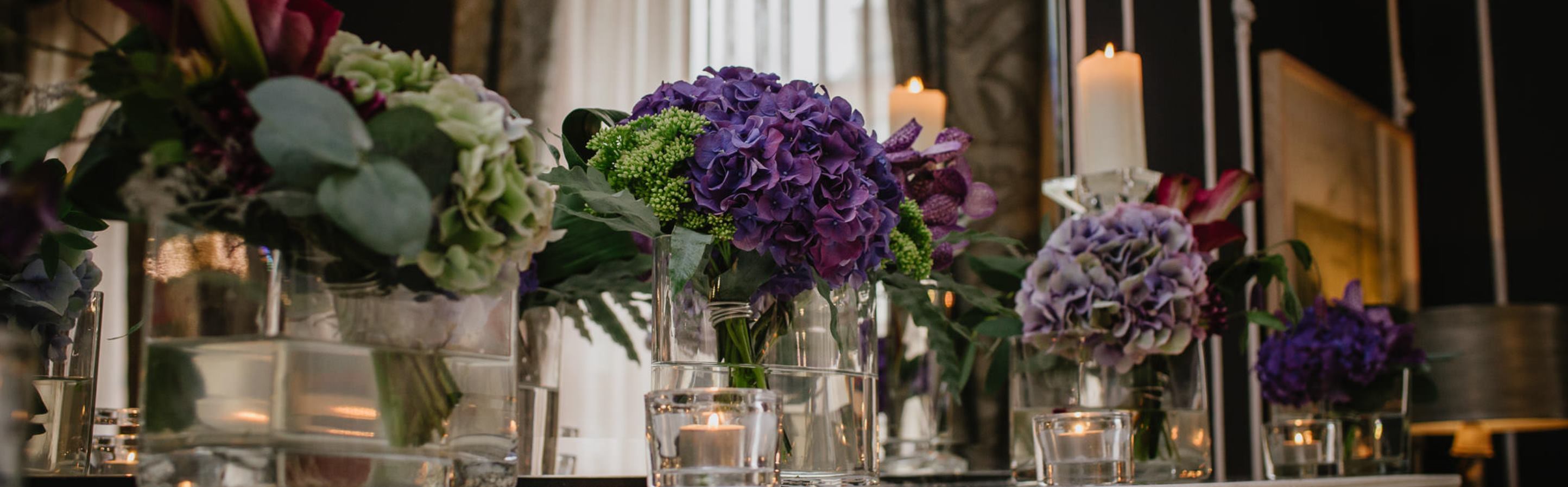 Bright purple flower bouquet by Blooming Amazing Flower Company