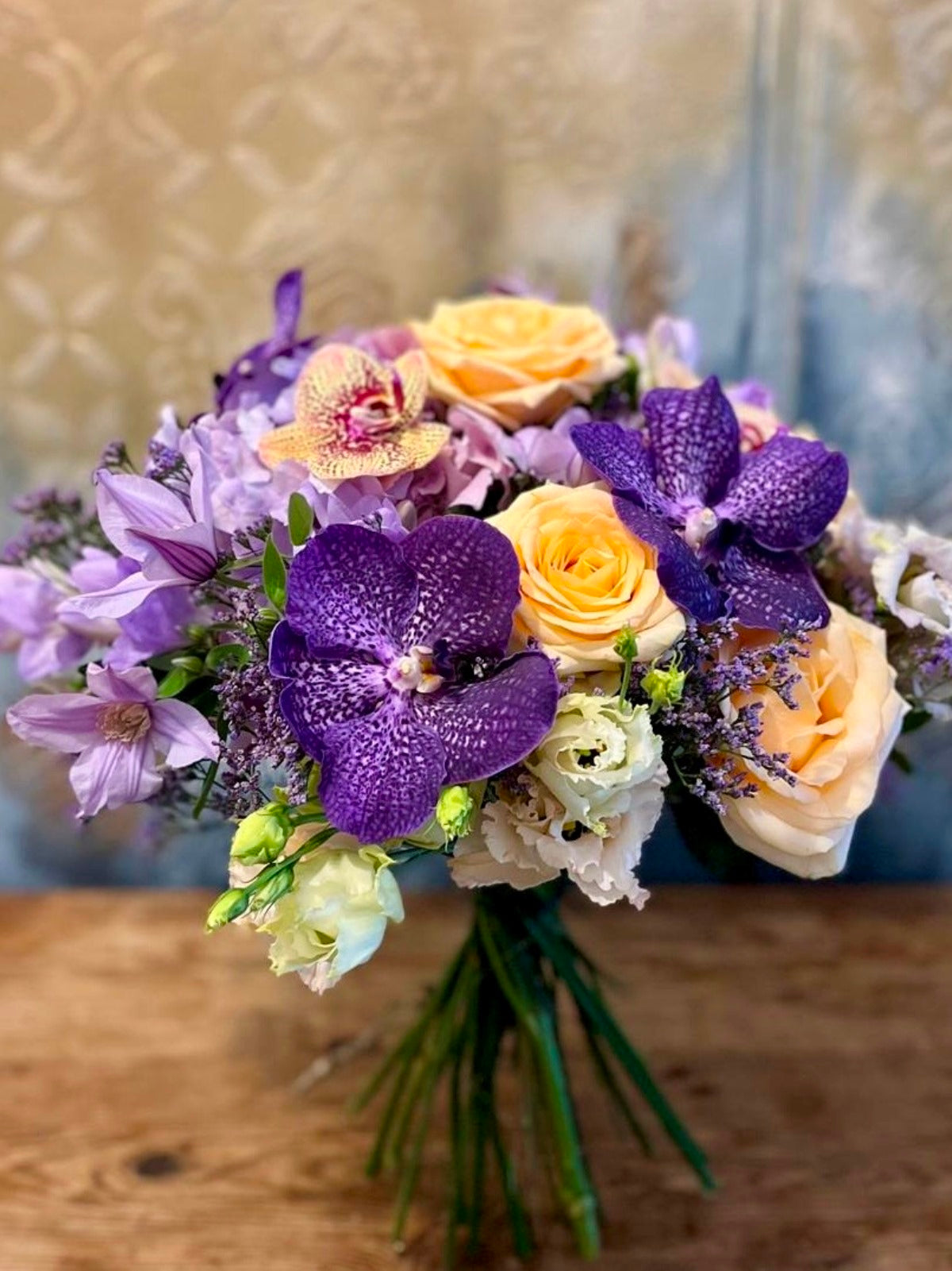 Bouquet of Blue and Peach Blooms