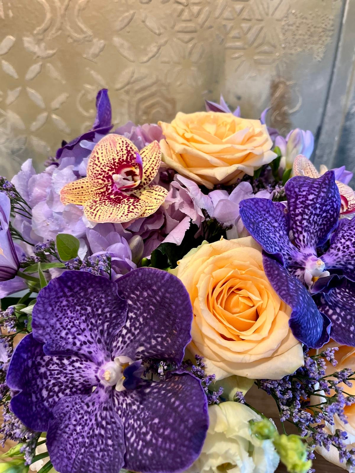 Bouquet of Blue and Peach Blooms zoomed in image