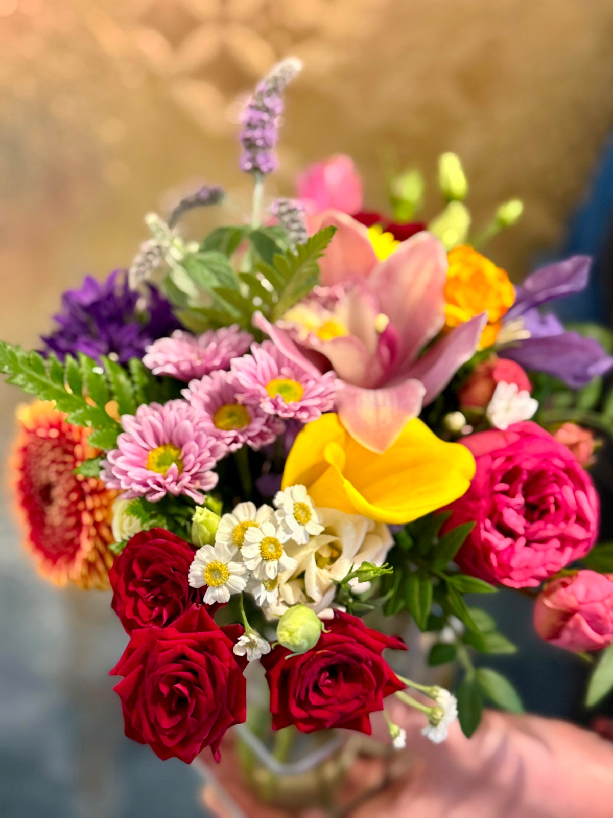 Blooms in Bottles. Petite flower arrangements in six mini milk bottle vases