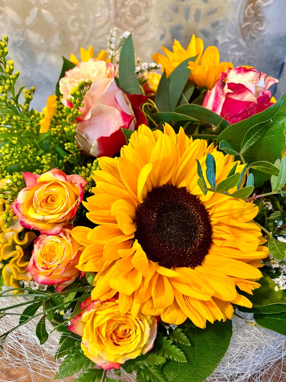 Sunflower bouquet in sisal frame close up