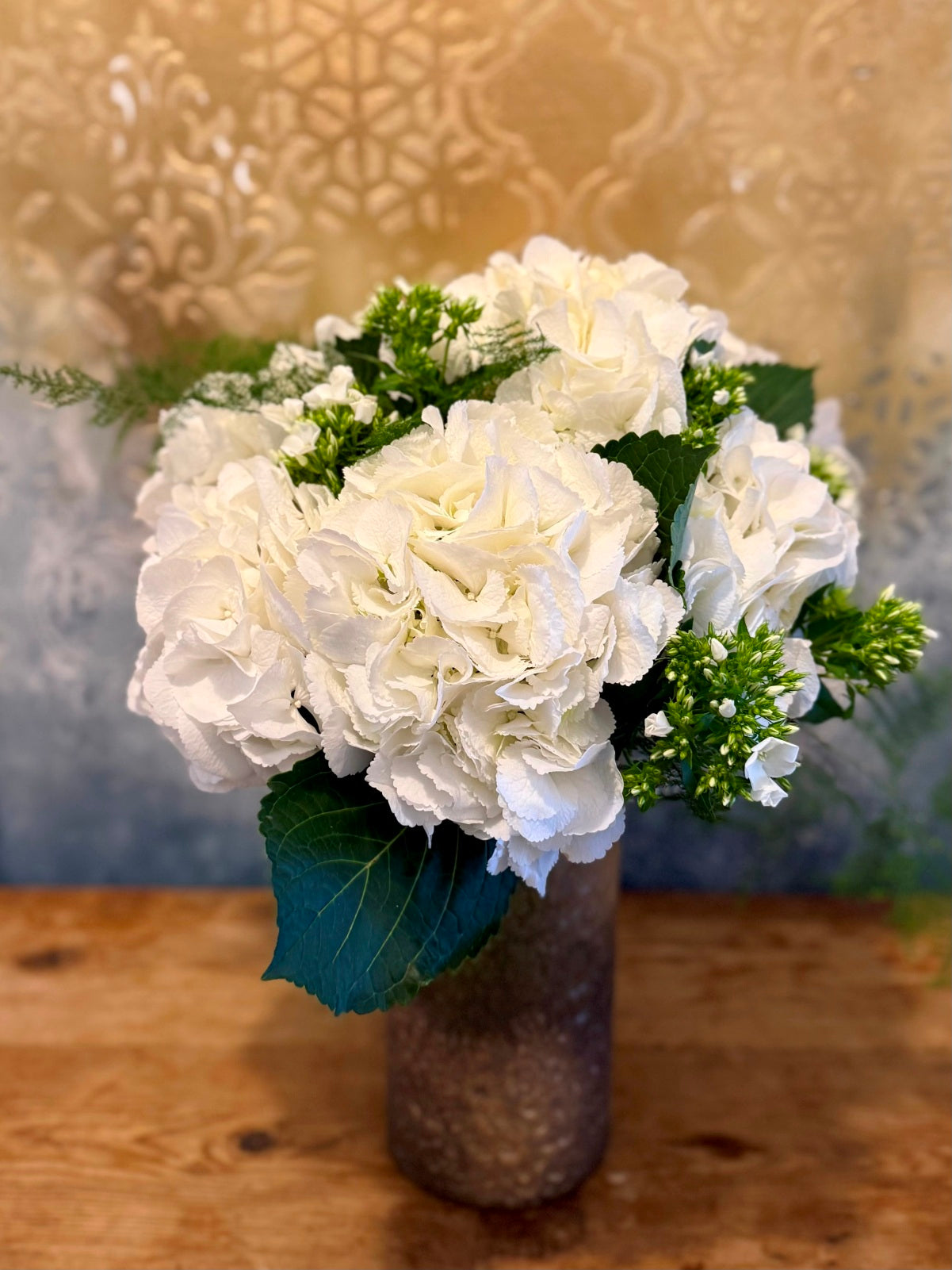 White Hydrangea Flowers in Vase