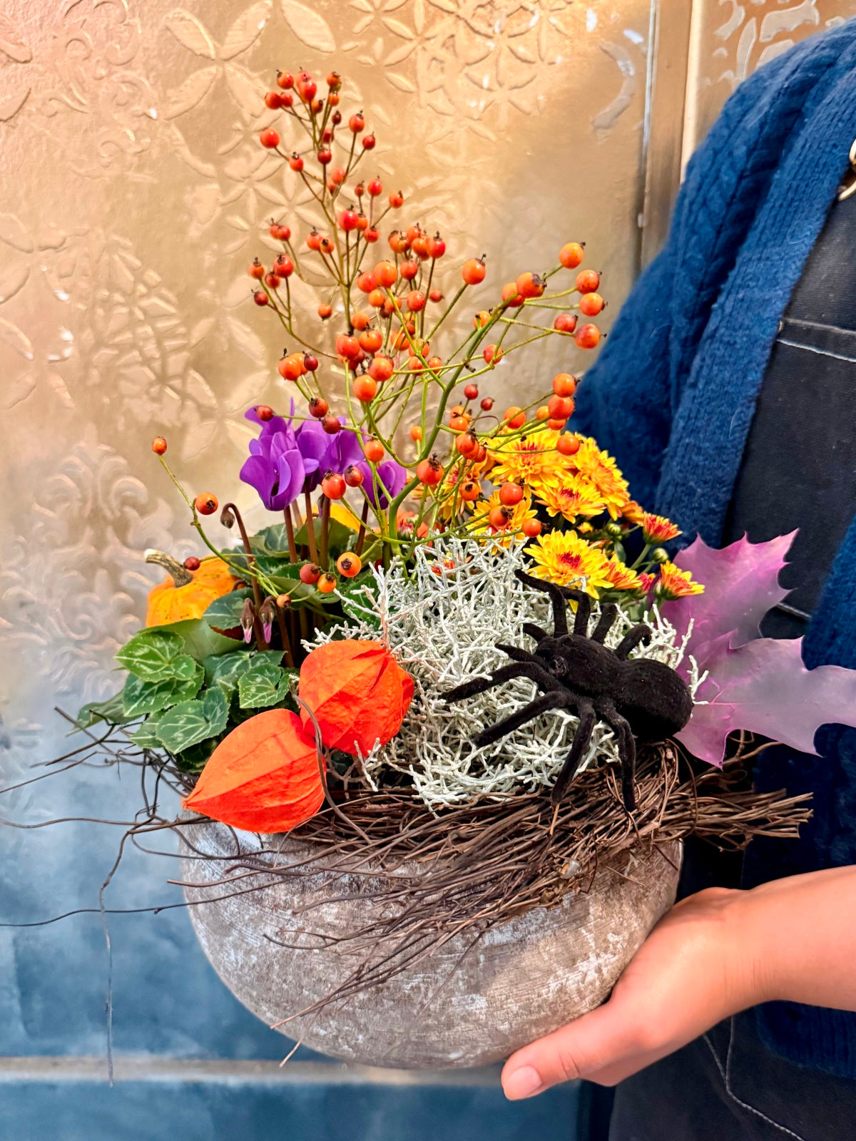 Halloween Planter being held for size reference