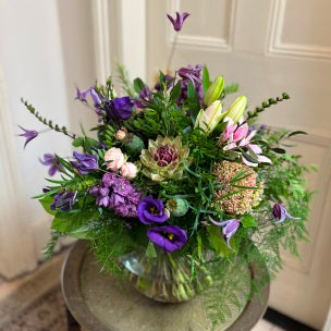 Flower arrangement in Purples and greens