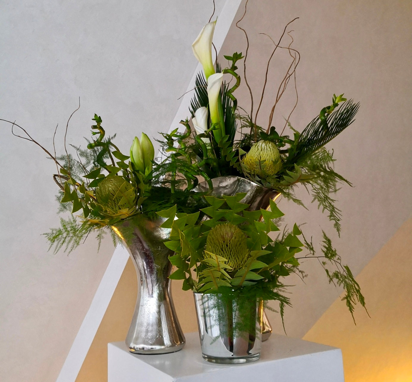 Elegant green flower arrangement by Blooming Amazing Flower Company