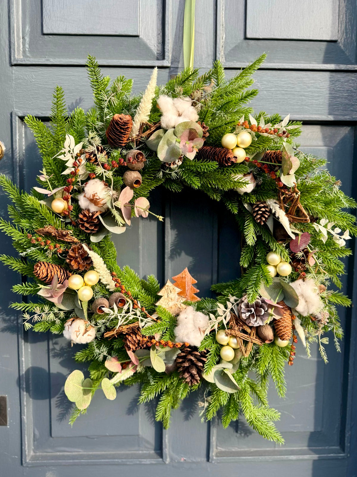 Artificial Christmas Door Wreath in Festive White