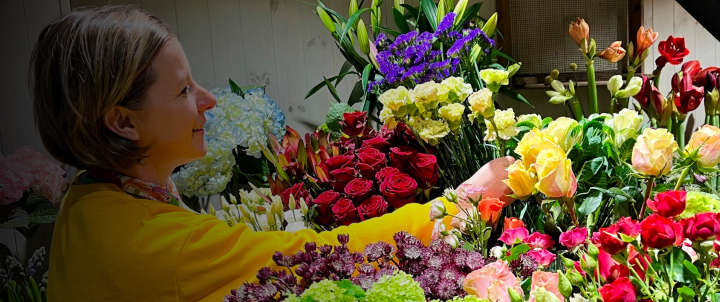 Luxury flower arrangement in reds, pinks and oranges