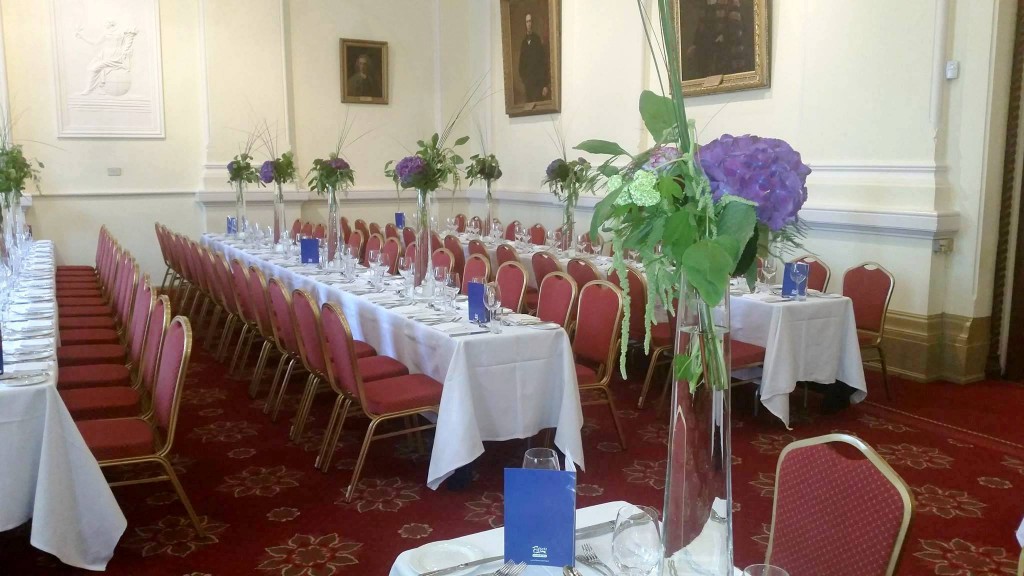 Royal College of Physicians Corrigan Hall decorated with tall Hydrangea flower arrangements in glass vases