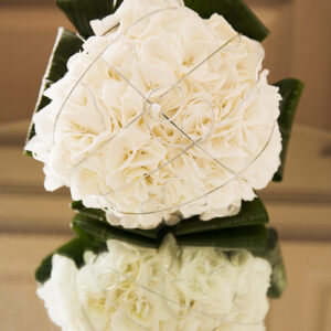 Brides bouquet of white hydranges with silver and pearl detail