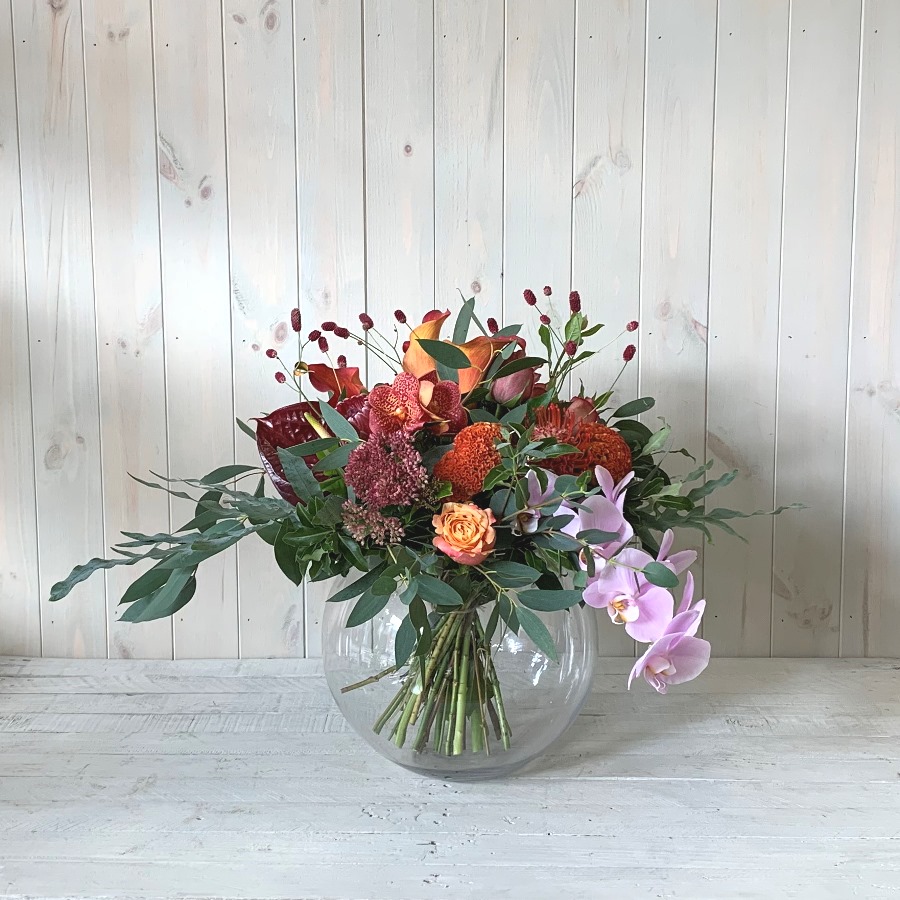 Beautiful autumn flowers in goldfish bowl vase for delivery in Dublin city and county