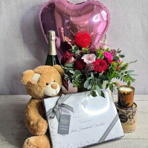 Deluxe valentines gift set including flowers, champagne, scented candle hand made chocolates and a cute teddy bear for delivery in Dublin