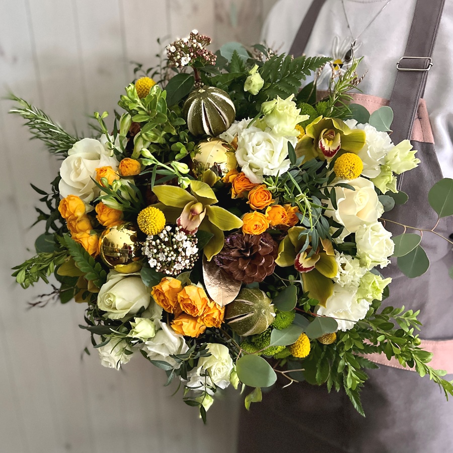 A Christmas Flower Bouquet in Oranges and Whites