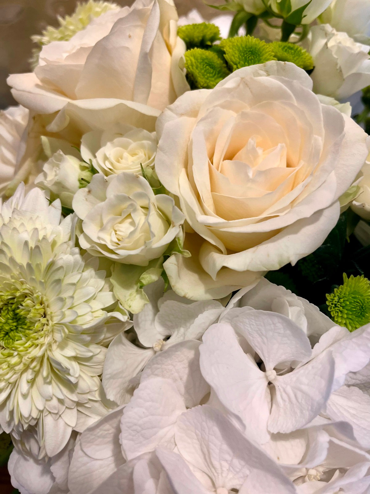 Bouquet of Creams Greens and Whites in Vase