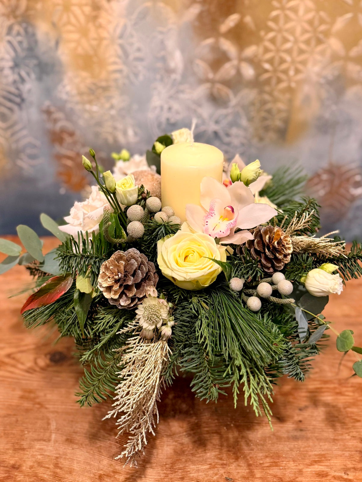 Christmas Candle White Flower Arrangement in Ceramic Container