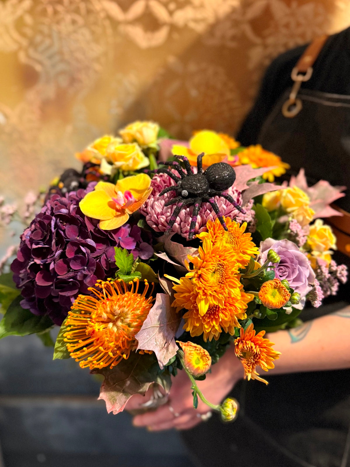 Halloween Flower Arrangement in Goldfish Bowl Vase Detail