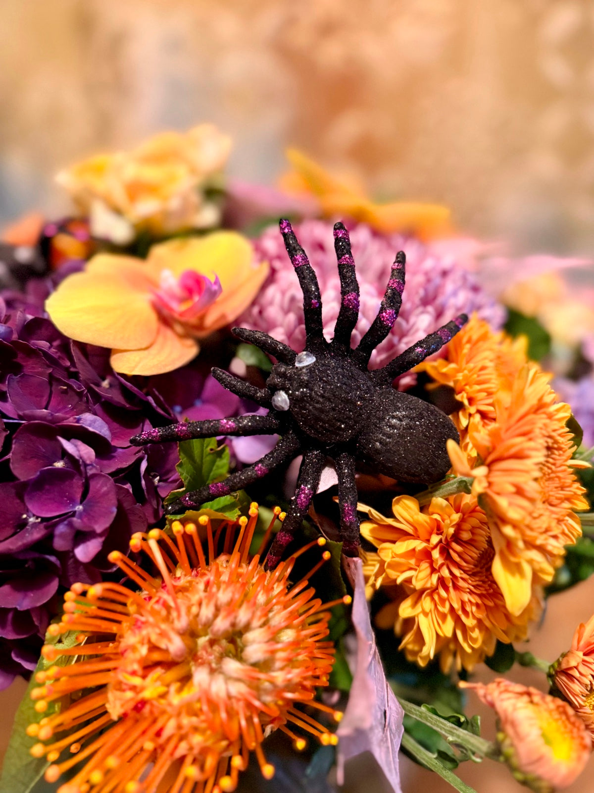 Halloween Flower Arrangement in Goldfish Bowl Vase Close Up