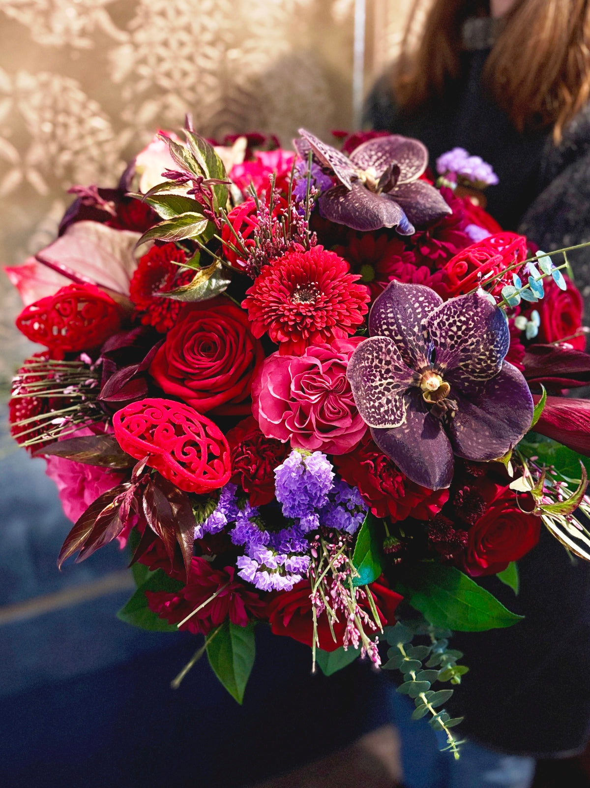 Valentines Divine Blooms Bouquet held