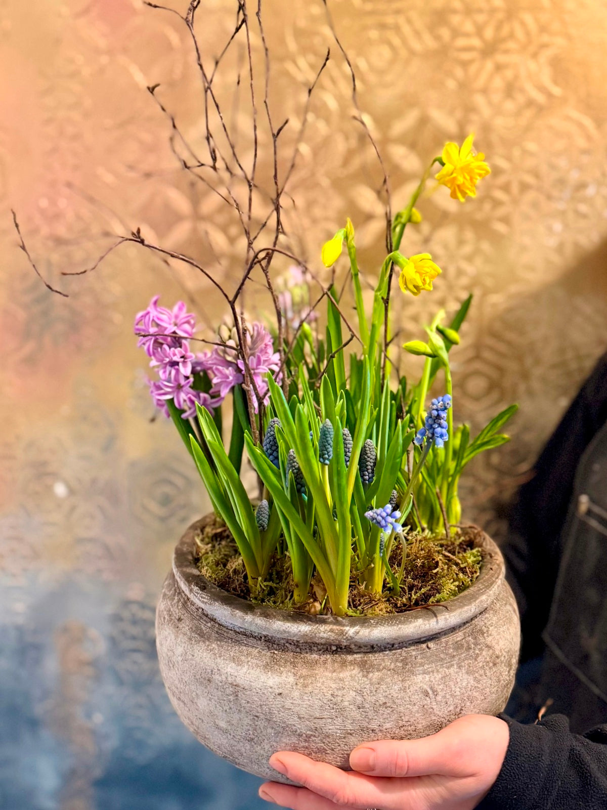 Scented spring planter held