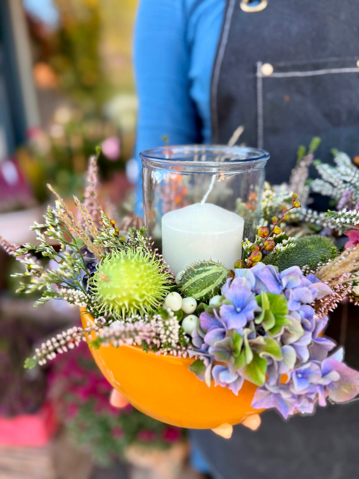 Autumnal Flower Arrangement with Hurricane Lamp Side View