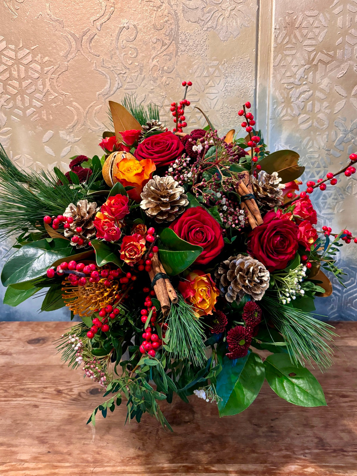 Fabulous Festive Flower Bouquet in Reds in Glass Vase